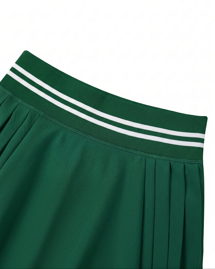 Front waistband closeup of TrackLine Rally Skirt in blackish green with striped athletic detail