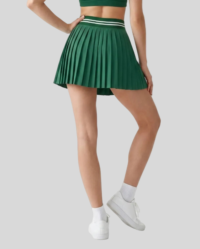 Back view of TrackLine Rally Skirt in blackish green featuring full pleated design