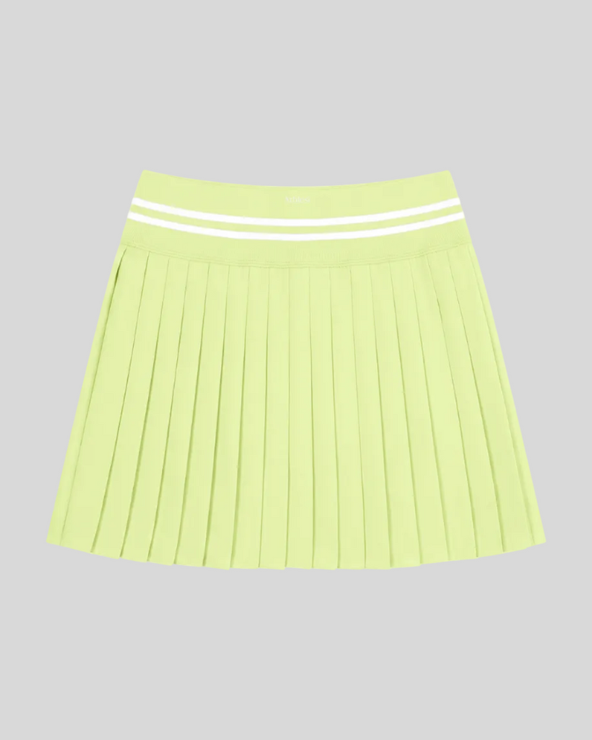 Back view of TrackLine Rally Skirt in light green with classic pleated silhouette