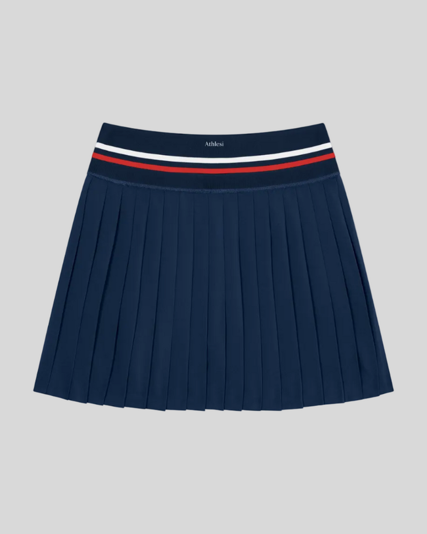 Back view of TrackLine Rally Skirt in navy blue with classic pleated silhouette
