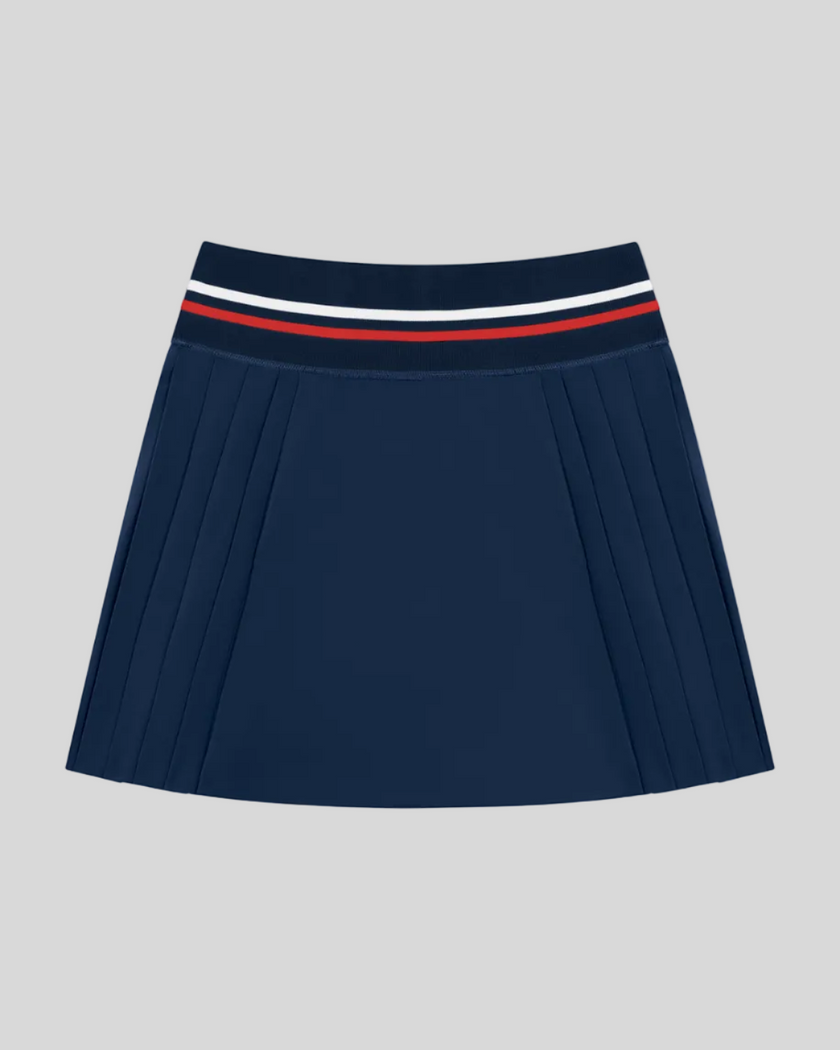 Front view of TrackLine Rally Skirt in navy blue featuring pleated athletic styling