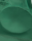 Interior removable chest pads closeup of TrackLine Rally Sports Bra in blackish green
