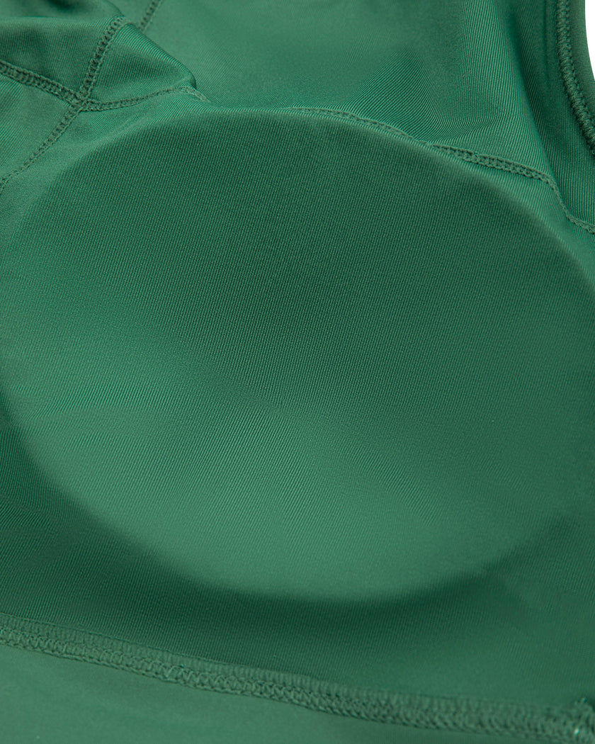 Interior removable chest pads closeup of TrackLine Rally Sports Bra in blackish green