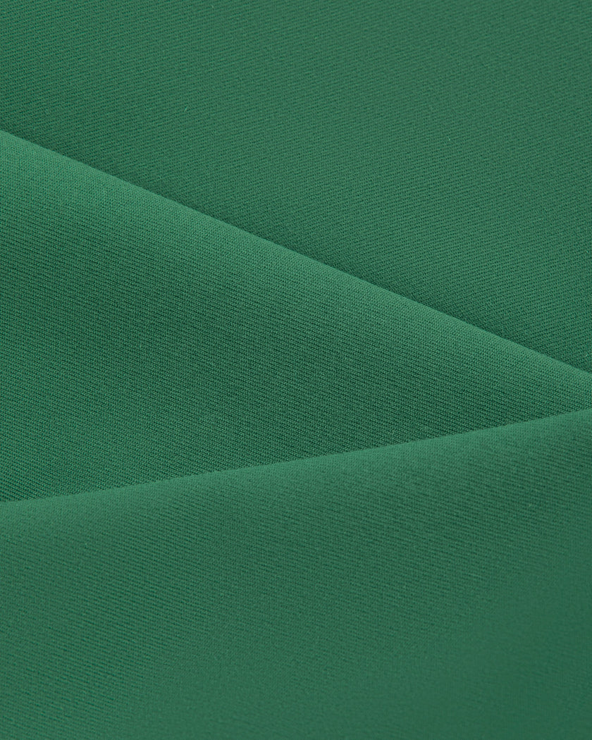 Performance stretch fabric closeup of TrackLine Rally Sports Bra in blackish green