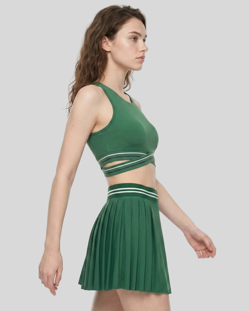 Angled front view of TrackLine Rally Sports Bra in blackish green showing contrast band detail