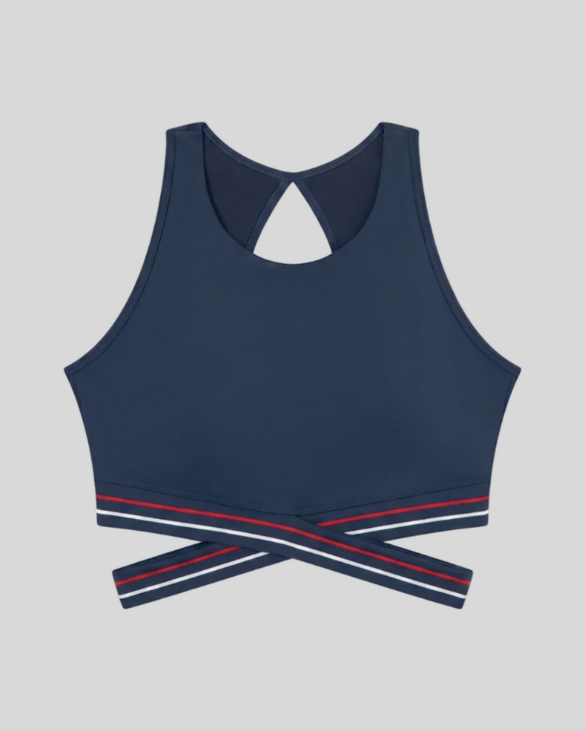Front view of TrackLine Rally Sports Bra in navy blue featuring contrast criss-cross band detail