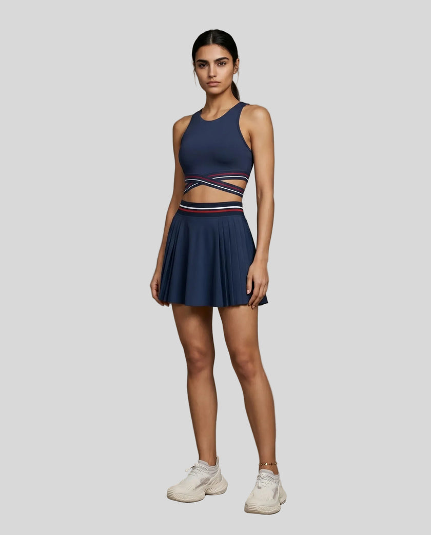 Angled front view of TrackLine Rally Sports Bra in navy blue showing contrast band detail