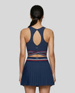Back view of TrackLine Rally Sports Bra in navy blue featuring open-back design