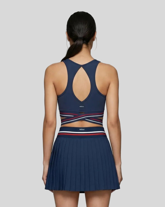 Back view of TrackLine Rally Sports Bra in navy blue featuring open-back design