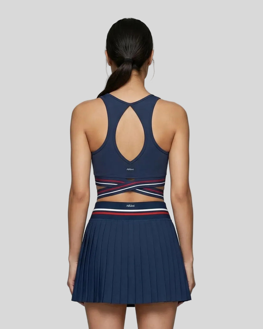Back view of TrackLine Rally Sports Bra in navy blue featuring open-back design