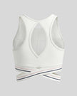 Back view of TrackLine Rally Sports Bra in white with open-back athletic design