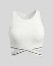 Front view of TrackLine Rally Sports Bra in white featuring contrast criss-cross band detail