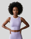 Model wearing the TrackLine Rally Tank in Lavender with White, front view.
