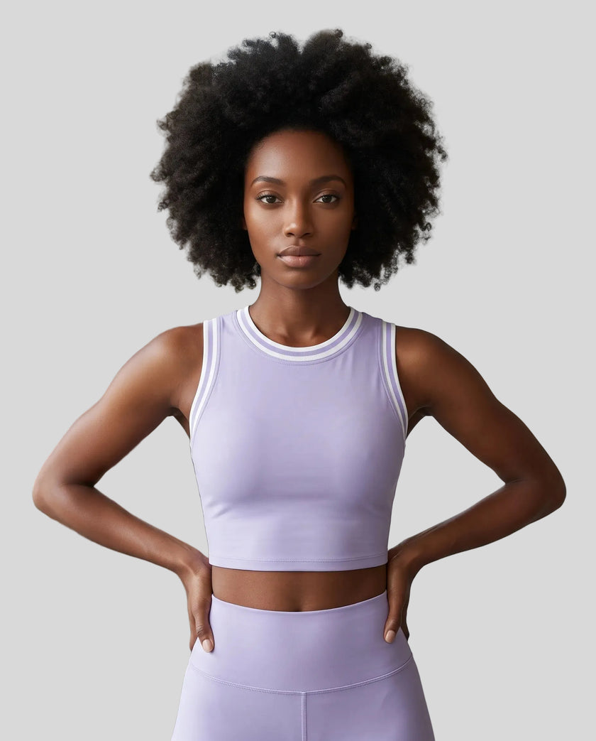 Model wearing the TrackLine Rally Tank in Lavender with White, front view.