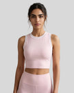 Model wearing the TrackLine Rally Tank in Light Pink with White, front view.