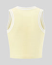 Back view of the TrackLine Rally Tank in Light Yellow with White featuring perforated panel detailing