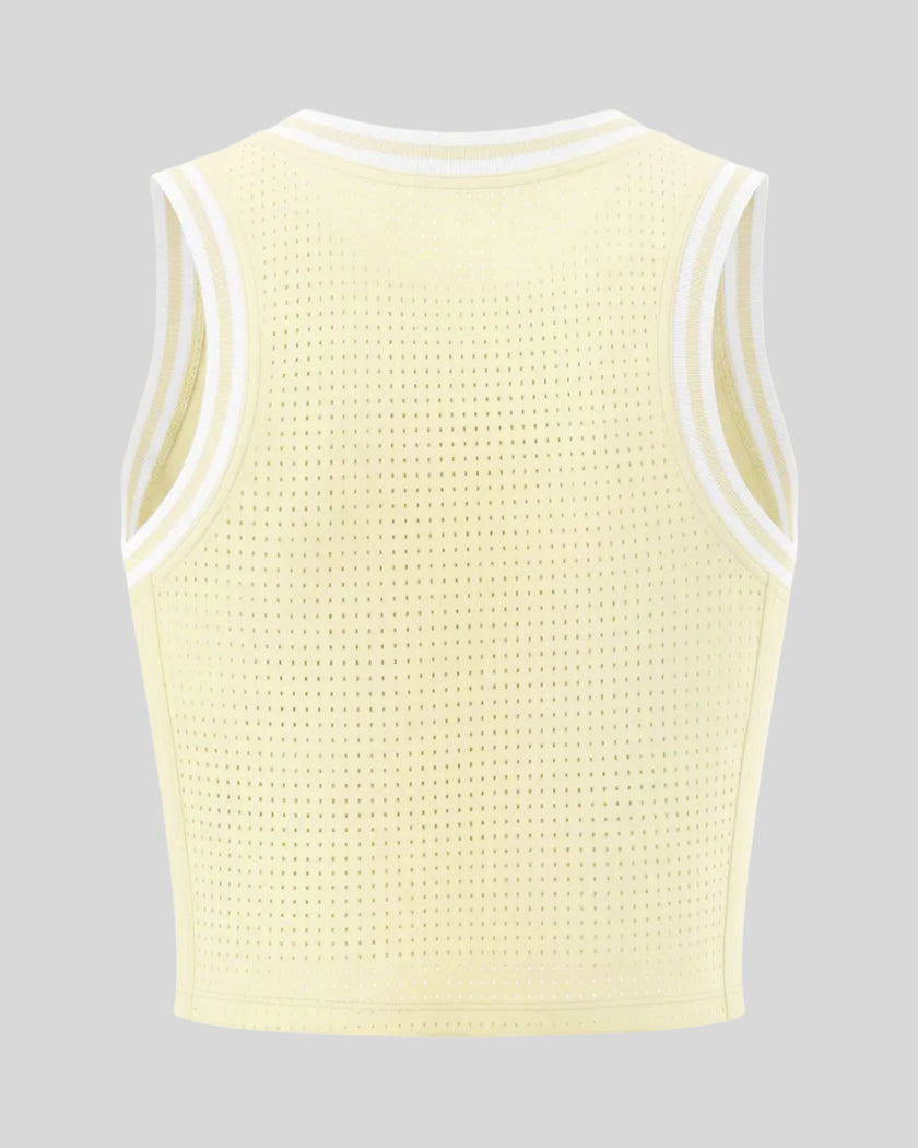 Back view of the TrackLine Rally Tank in Light Yellow with White featuring perforated panel detailing