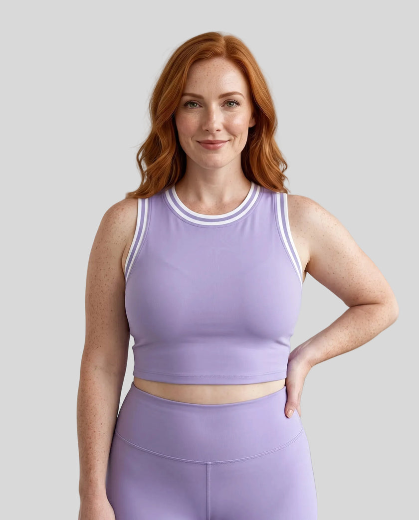 Model wearing the TrackLine Rally Tank in Purple with White, front view.