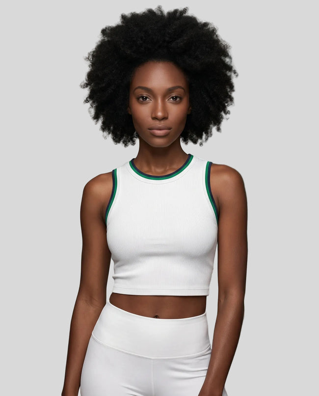 Model wearing the TrackLine Rally Tank in White with Green, front view.