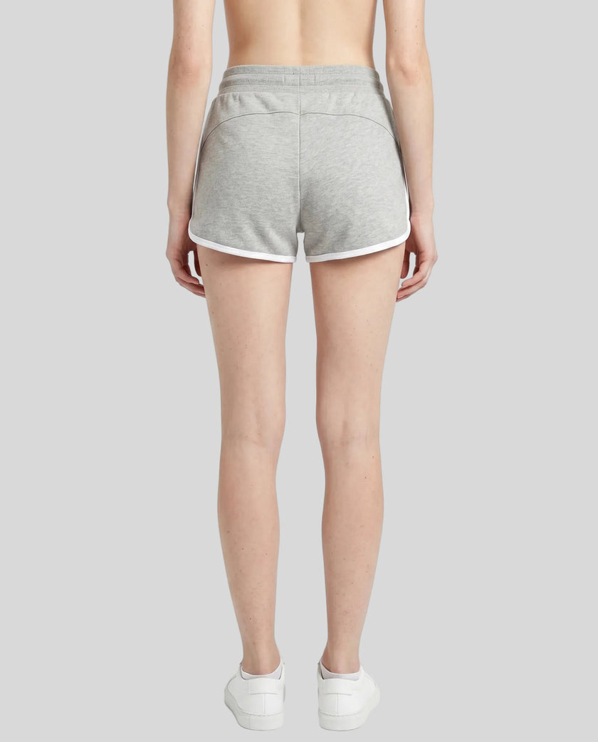 Back view of model wearing the Athlesi TrackLine Retro Shorts in flower gray and white