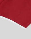 Leg hem and contrast binding detail of TrackLine Retro Shorts in Red