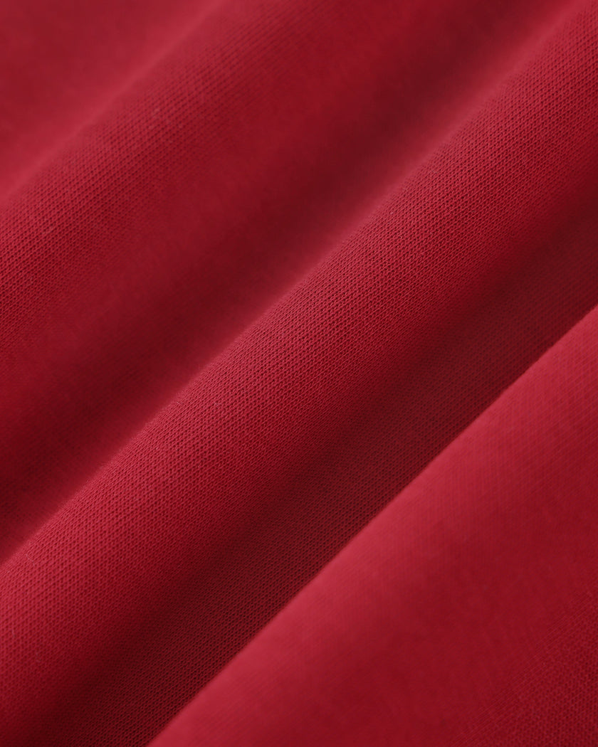 Soft cotton blend fabric texture of the Athlesi TrackLine Retro Shorts in red and white