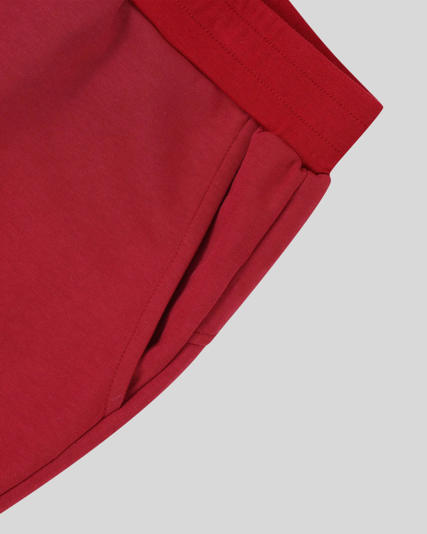 Side pocket detail of the Athlesi TrackLine Retro Shorts in red and white