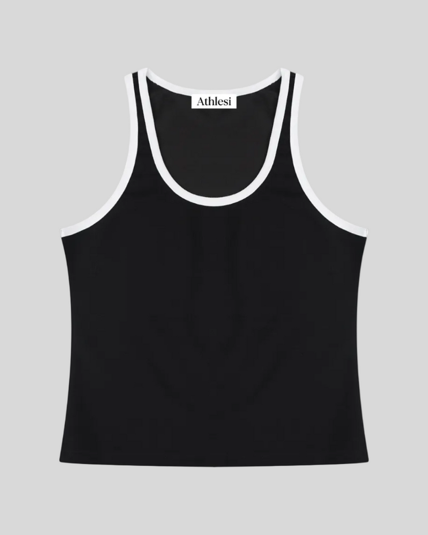 Athlesi TrackLine Retro Tank in black and white, flatlay front view with retro athletic contrast trim