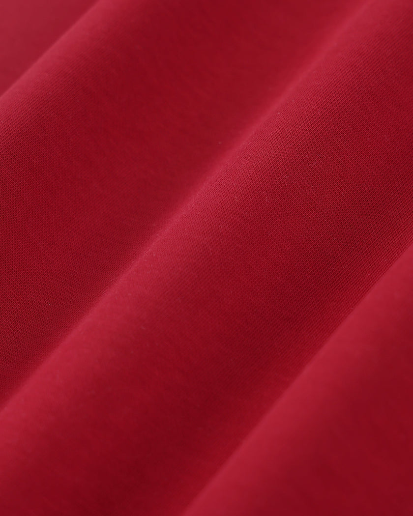 Soft cotton blend fabric texture of the Athlesi TrackLine Retro Tank in red and white