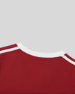 Back collar detail closeup of the Athlesi TrackLine Retro V-Neck Tee in red