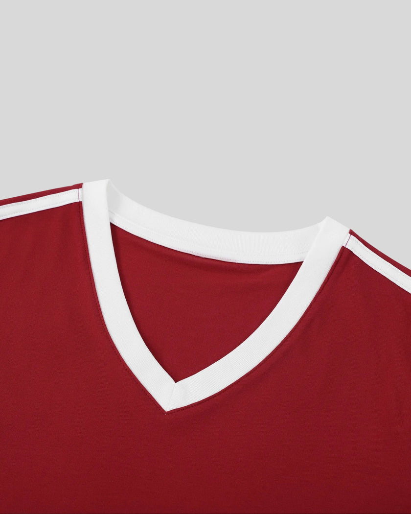 Front V-neck collar detail closeup of the Athlesi TrackLine Retro V-Neck Tee in red
