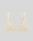 Front view of Trackline Riviera Sports Bra in Light Apricot