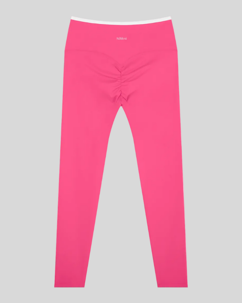 Back view of TrackLine Sculpt Leggings in rose pink and white with contour shaping and ruched detail