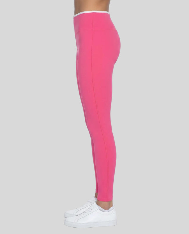 Side profile of model wearing TrackLine Sculpt Leggings with sculpting silhouette