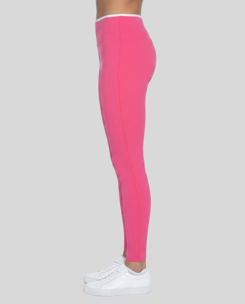 Side profile of model wearing TrackLine Sculpt Leggings with sculpting silhouette