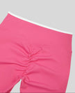 Back waist and hip closeup of TrackLine Sculpt Leggings with sculpt contour seam detail