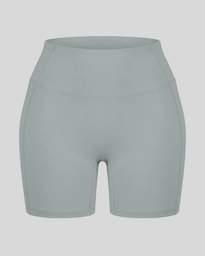 TrackLine Sculpt Shorts in haze blue with high-rise waistband and fitted biker-short silhouette front view