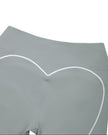Closeup of back waistband and curved white piping detail on haze blue TrackLine Sculpt Shorts