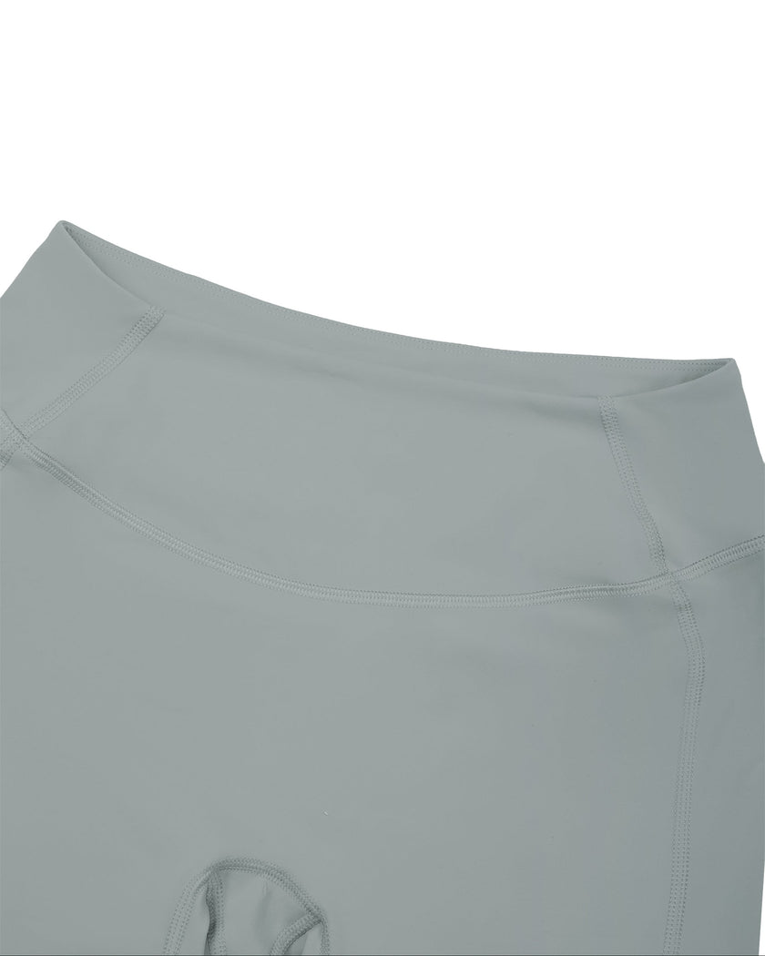 Closeup of high-rise elastic waistband and front stitching on haze blue TrackLine Sculpt Shorts
