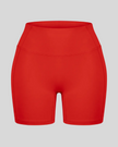 TrackLine Sculpt Shorts in red with high-rise waistband and fitted biker-short silhouette front view