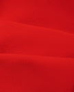 Closeup of smooth red nylon-spandex fabric on TrackLine Sculpt Sports Bra
