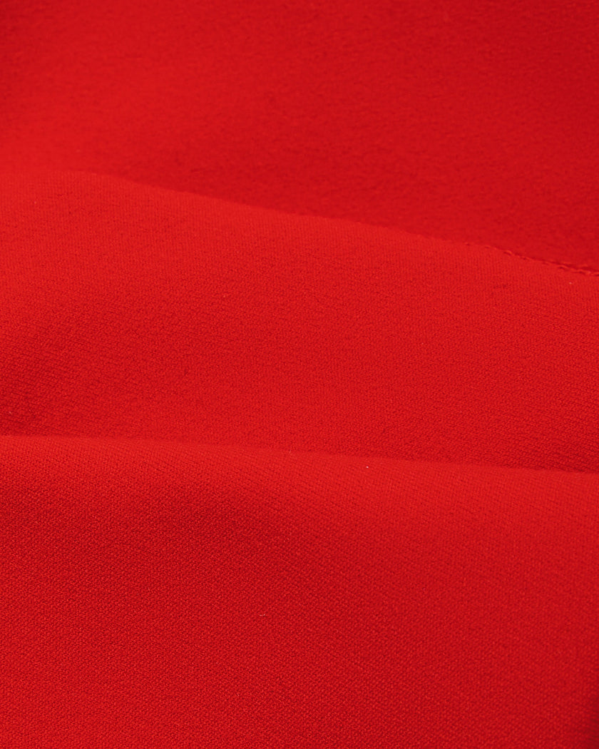 Closeup of smooth red nylon-spandex fabric on TrackLine Sculpt Sports Bra