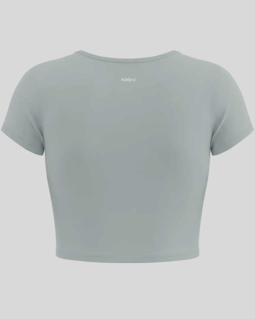 Back view of TrackLine Sculpt Tee in haze blue with short sleeves and subtle Athlesi logo