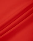 Closeup of red stretch nylon blend fabric on TrackLine Sculpt Tee
