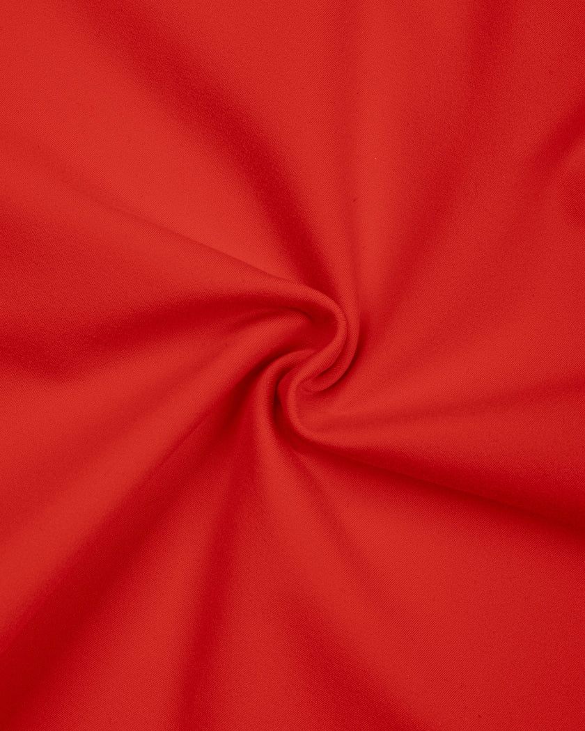Detailed view of smooth stretch fabric and stitching on red TrackLine Sculpt Tee