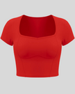 TrackLine Sculpt Tee in red with square-inspired neckline and contour stitching front view