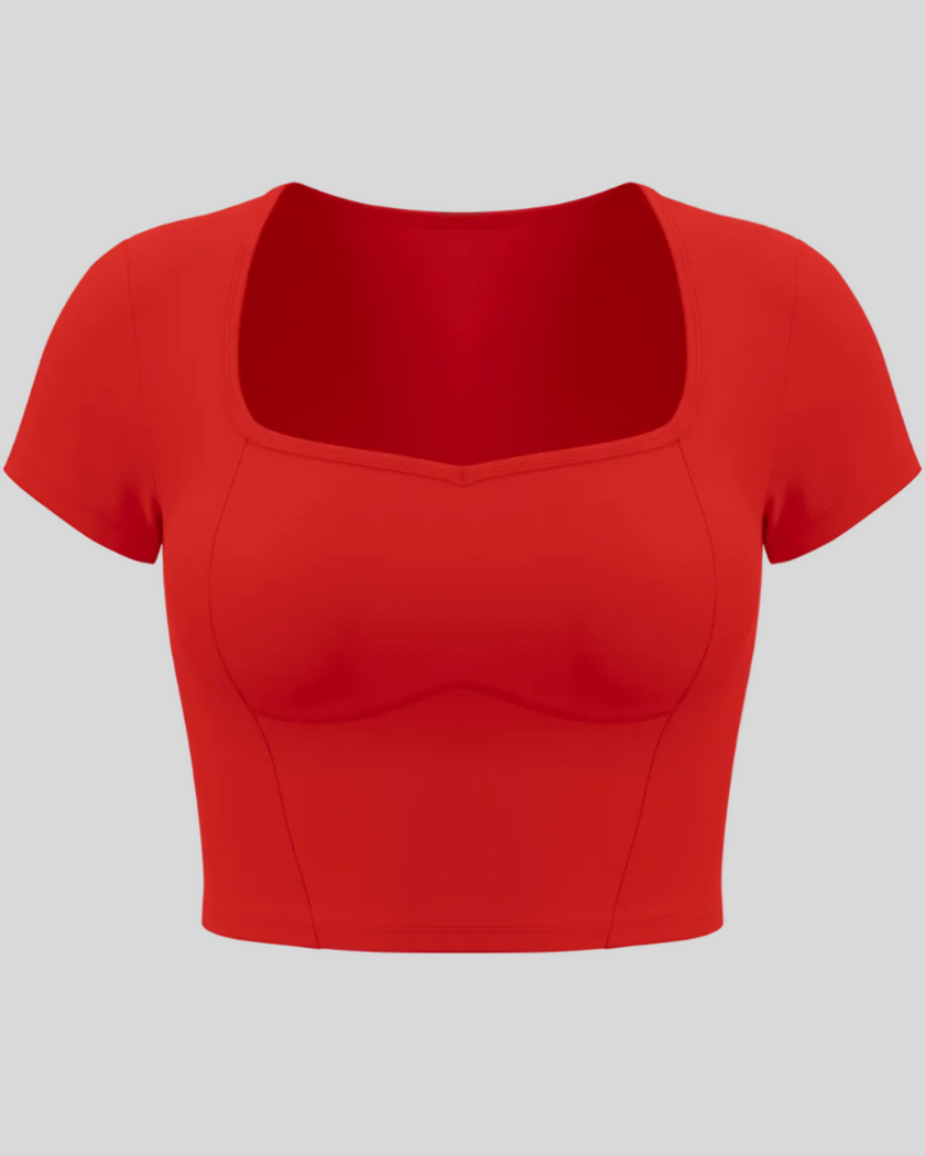TrackLine Sculpt Tee in red with square-inspired neckline and contour stitching front view