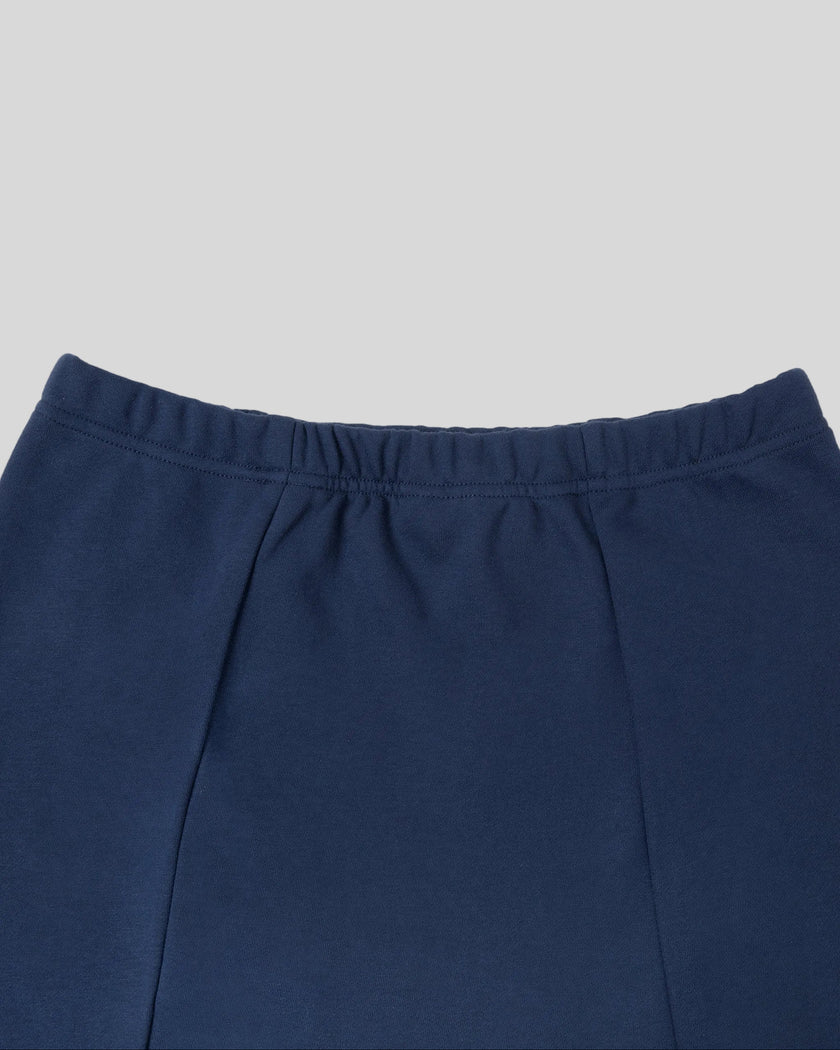 Back waistband detail closeup of the Athlesi TrackLine Slit Skirt in blue