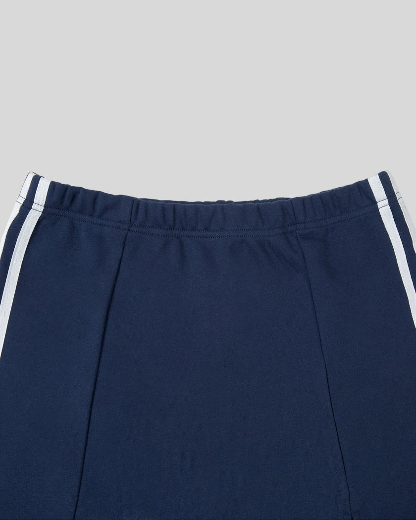 Front waistband closeup of the Athlesi TrackLine Slit Skirt in blue