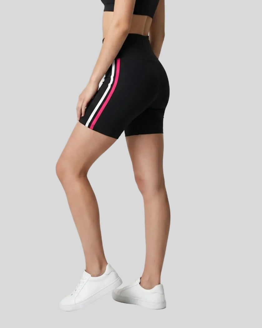 Angled back view of the TrackLine Sprint Shorts in black, highlighting the supportive high-rise fit